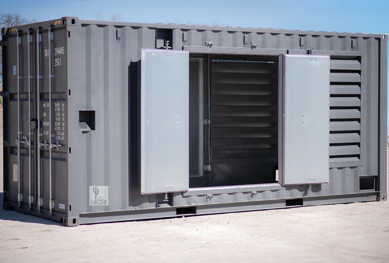 A Cactus Containers generator enclosure, fabricated from a shipping container with louvred ventilation and lockable service doors, on a trailer